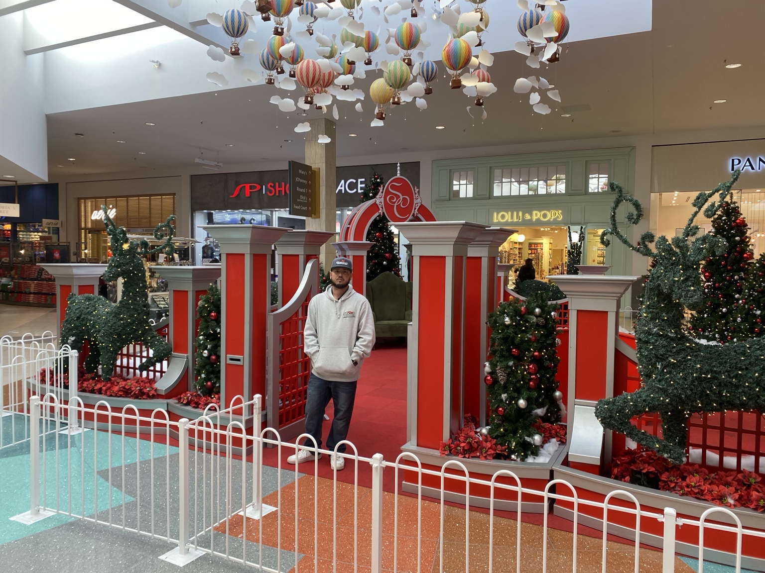 Completed Coronado Center Santa set with reindeer topiaries and arch